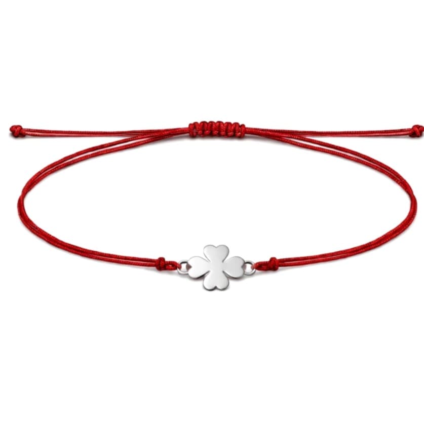 Гривна с червен конец и детелина от бяло злато