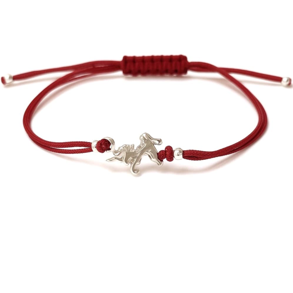 Гривна с червен конец и сребърен талисман "Еднорог"
