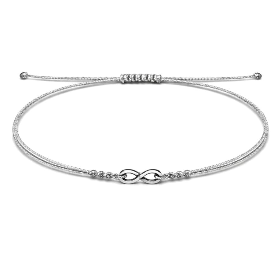 Гривна със сребрист конец и безкрайност от бяло злато